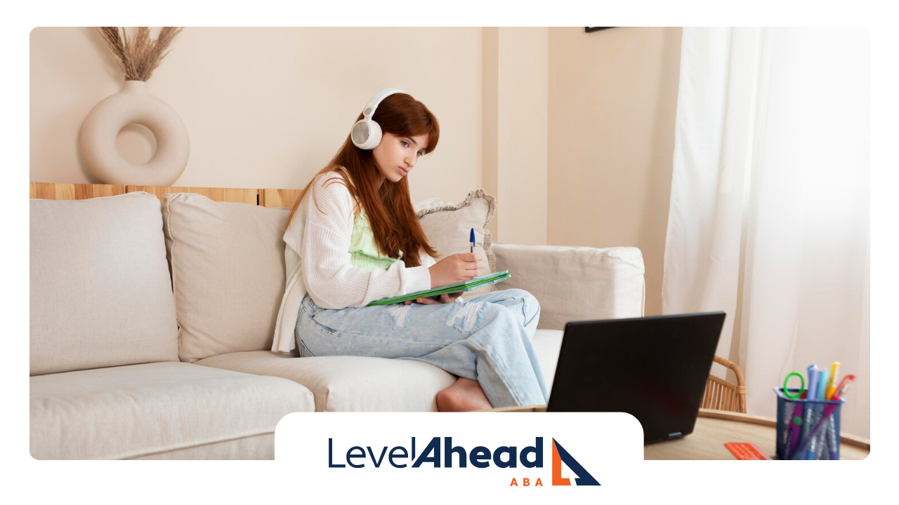 An autistic adult working from home
