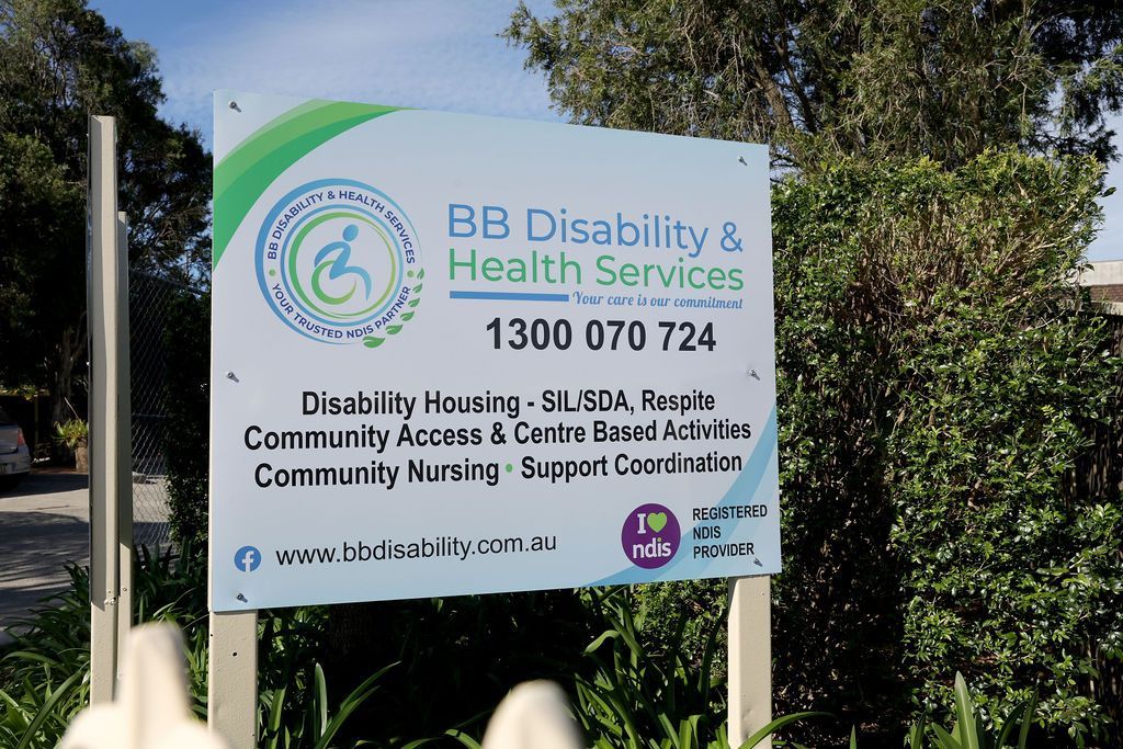 A sign that says bb disability and health services