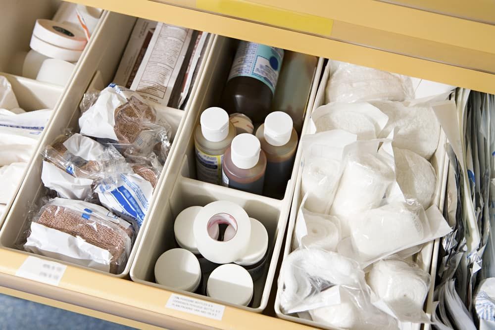 A Drawer Filled With Medical Supplies Including Bottles And Bandages — Health Hub Mackay In Moranbah, QLD