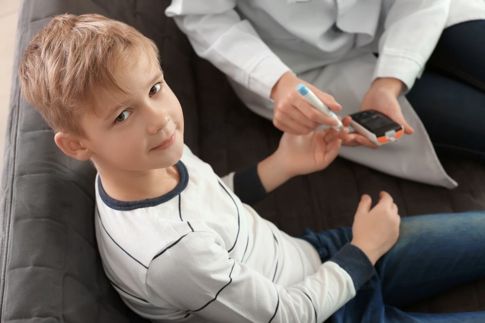 Nurse Getting Blood On Boy — Health Hub Mackay in Mackay, QLD