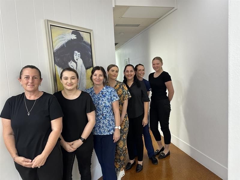 A Group of Women Are Posing for A Picture — Health Hub Mackay in Mackay, QLD