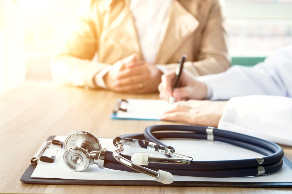 Doctor Talking To A Woman