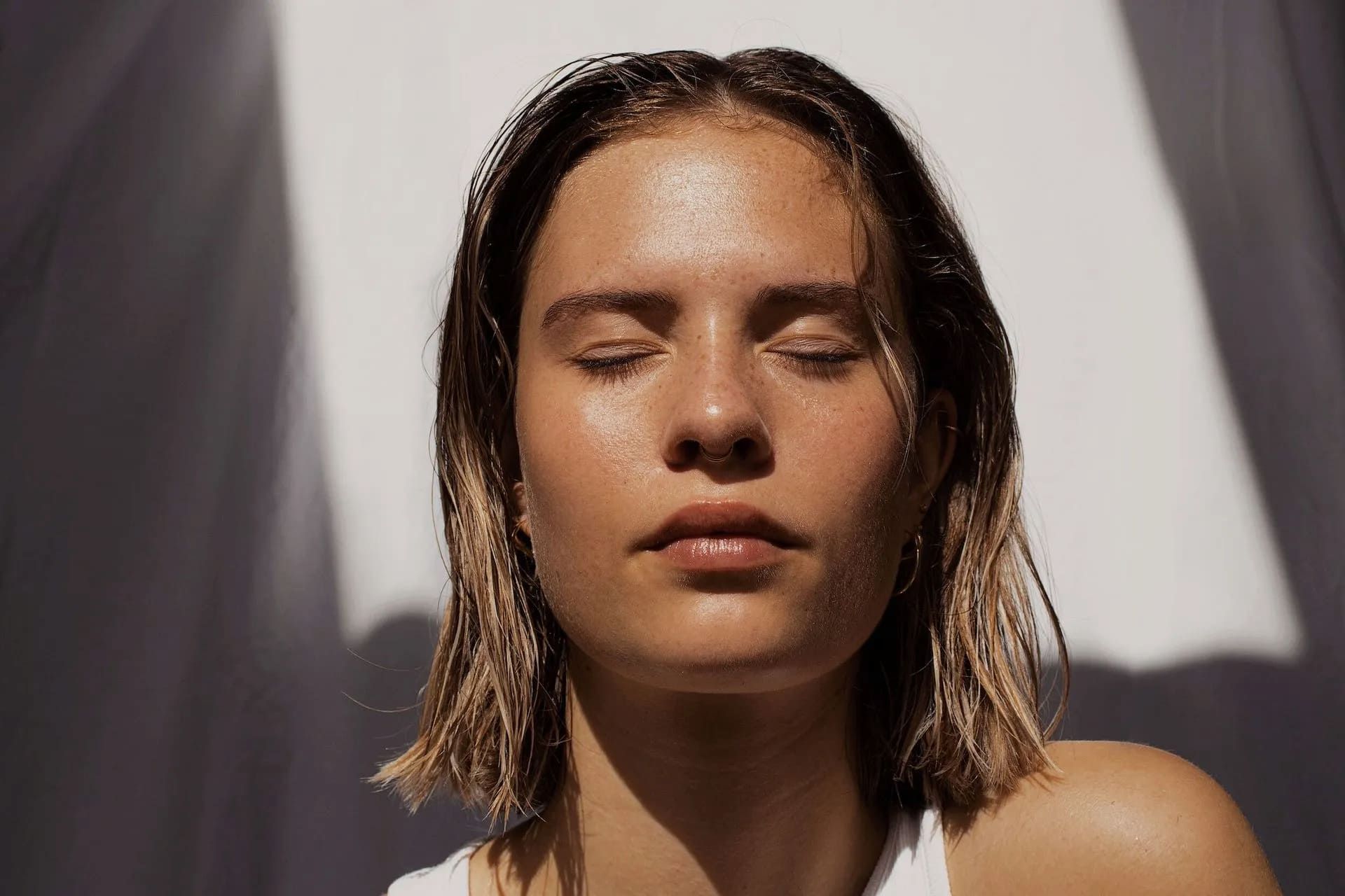 A Close up Of a Woman 's Face with Her Eyes Closed — Health Hub Mackay in Mackay, QLD