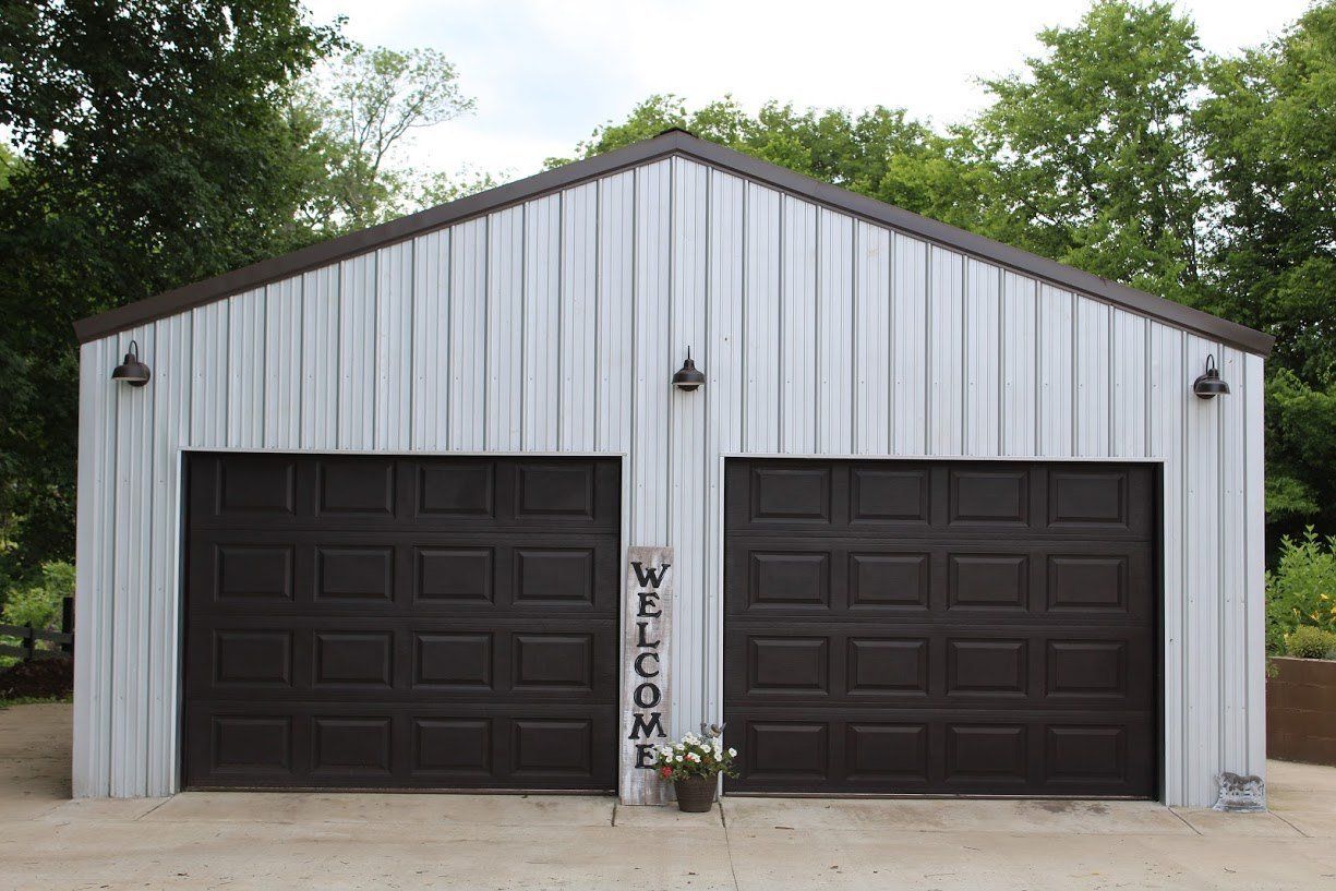 Garage with two dark brown doors