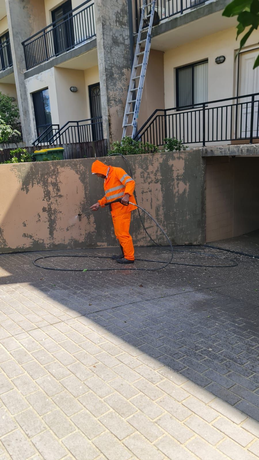 Man Outside the Residential Building- Sydney, NSW - Marano Painting Pty Ltd