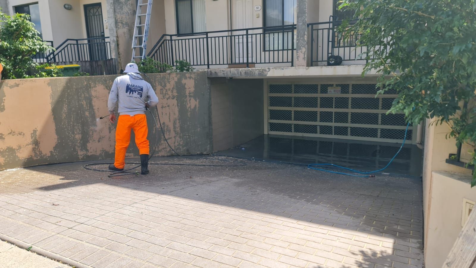 Man Holding Spray Piant - Sydney, NSW - Marano Painting Pty Ltd