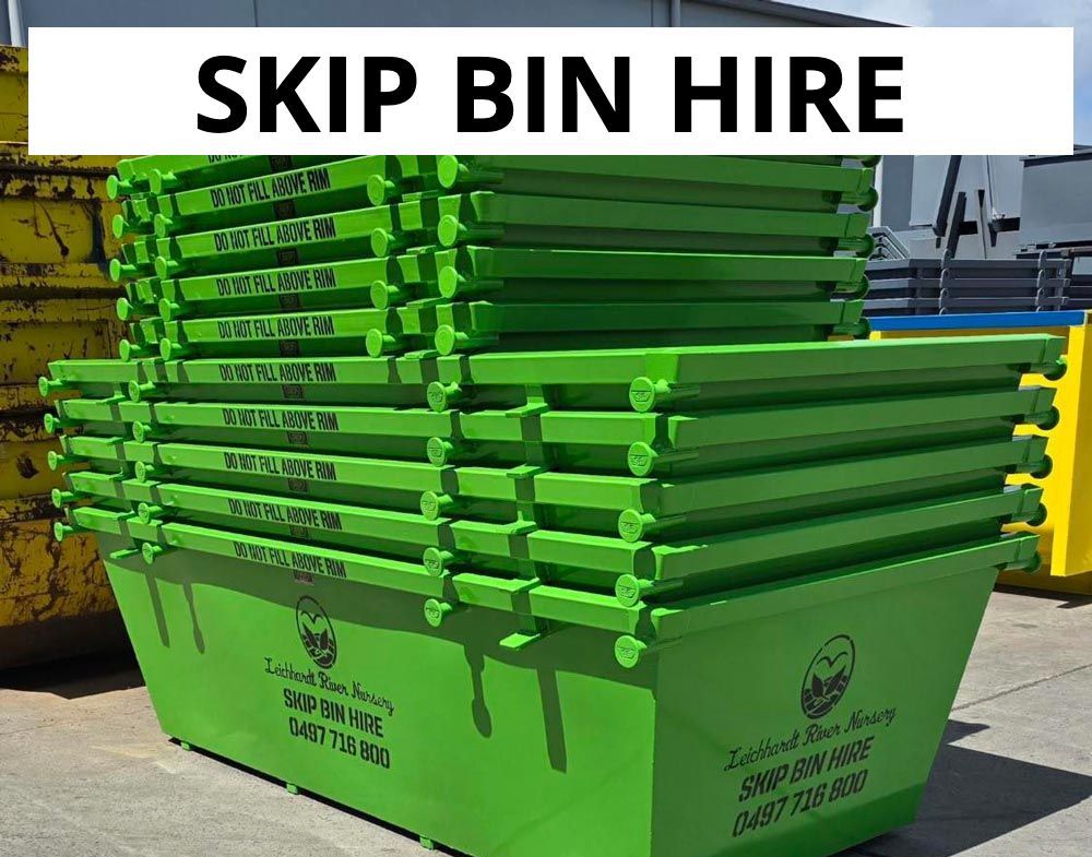 Green skip bins stacked, with text