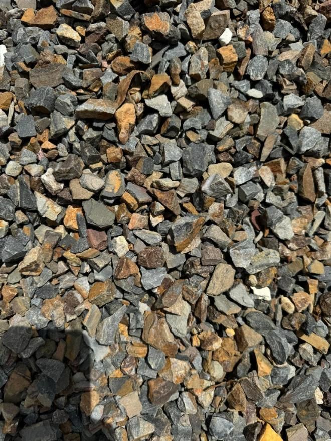 A Pile of Rocks With a Shadow on the Ground — Leichhardt River Nursery & Skip Bin Hire In Kalkadoon, QLD