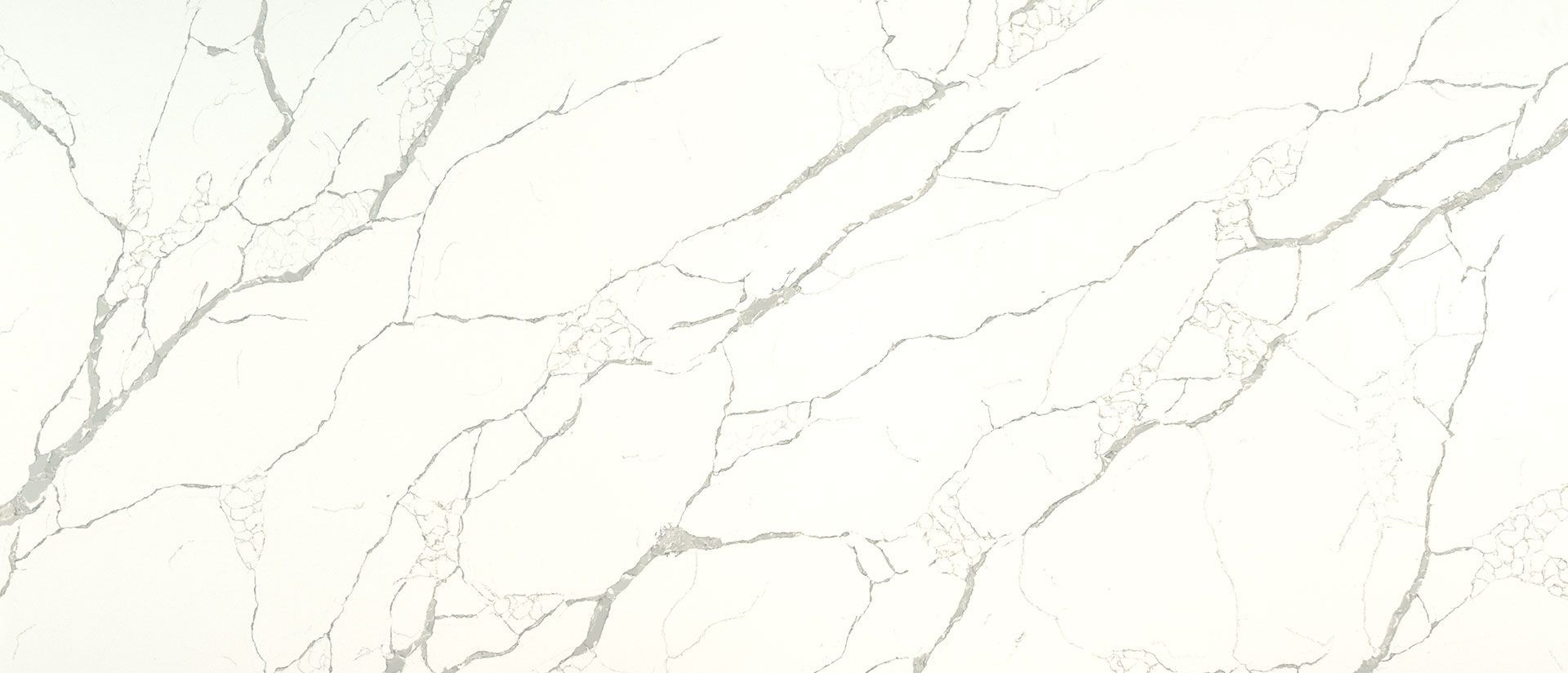 A close up of a white marble slab on a white background.