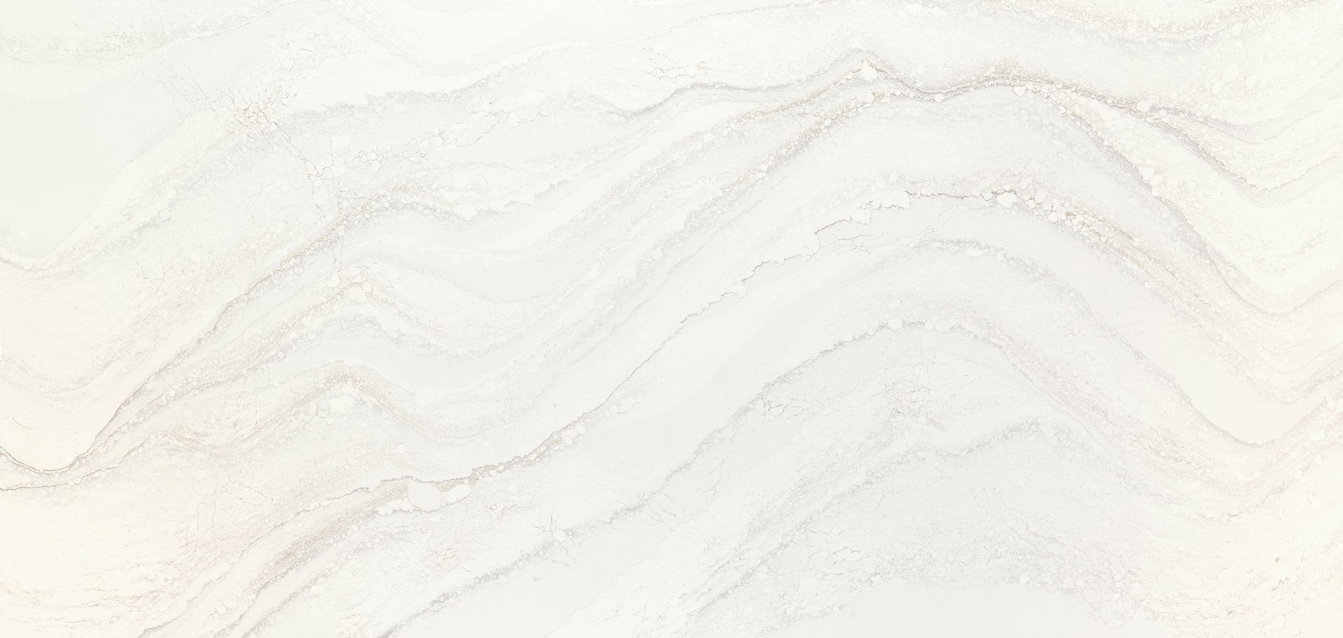 A close up of a white granite counter top with a marble texture.