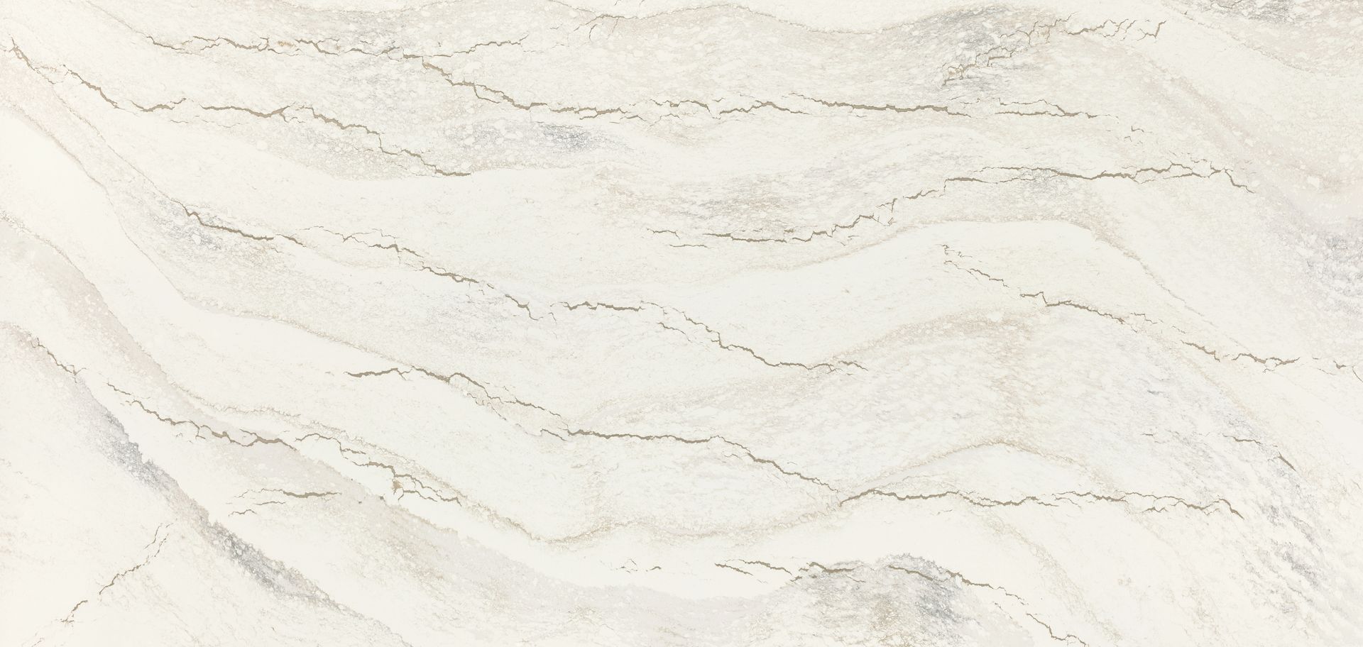 A close up of a white marble counter top.