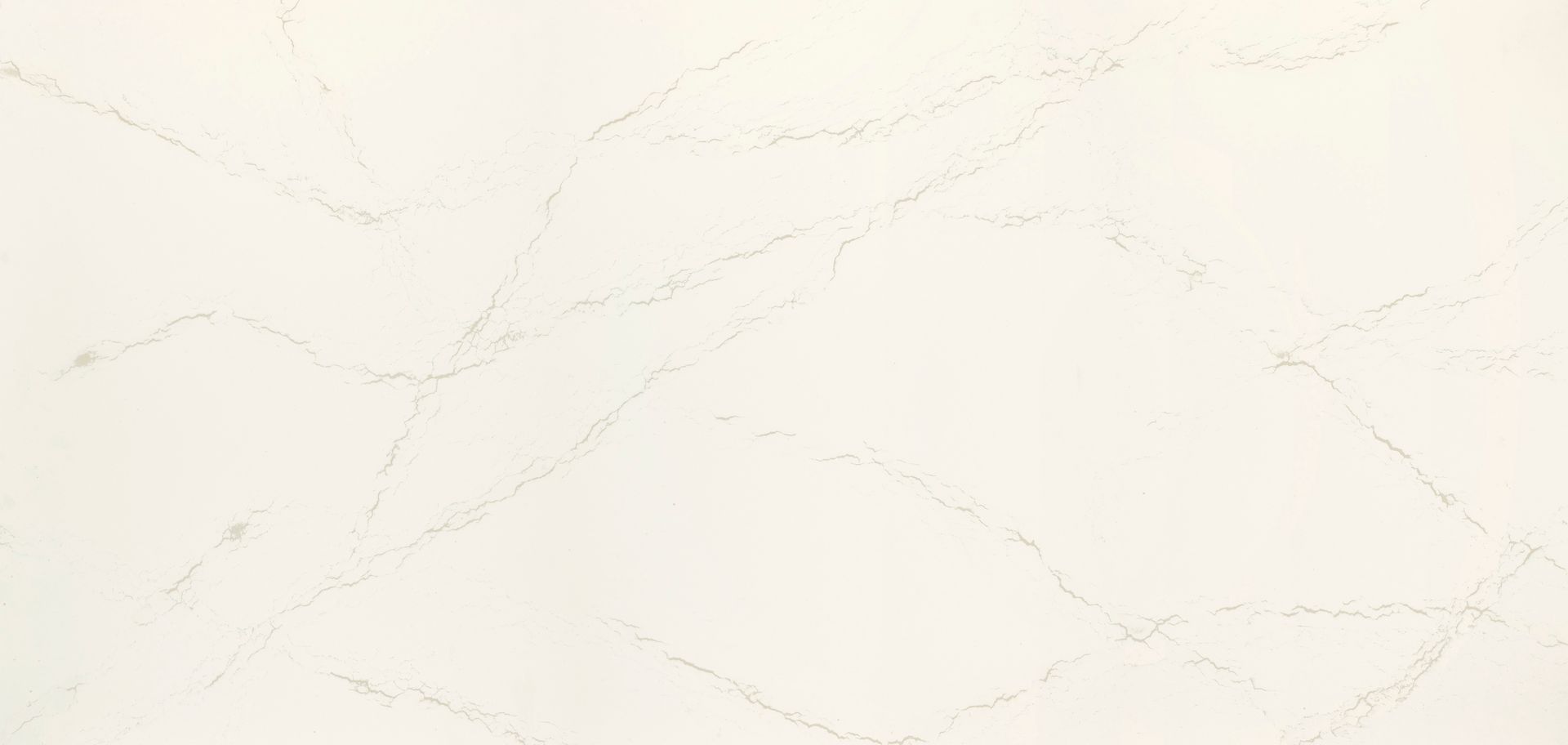 A close up of a white marble counter top.