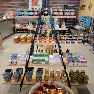 A store filled with lots of jars and bottles of food.
