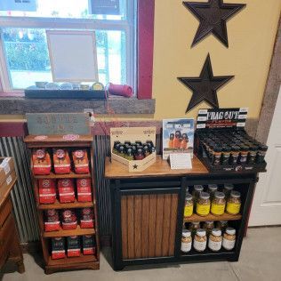 A room filled with lots of shelves and jars of food.