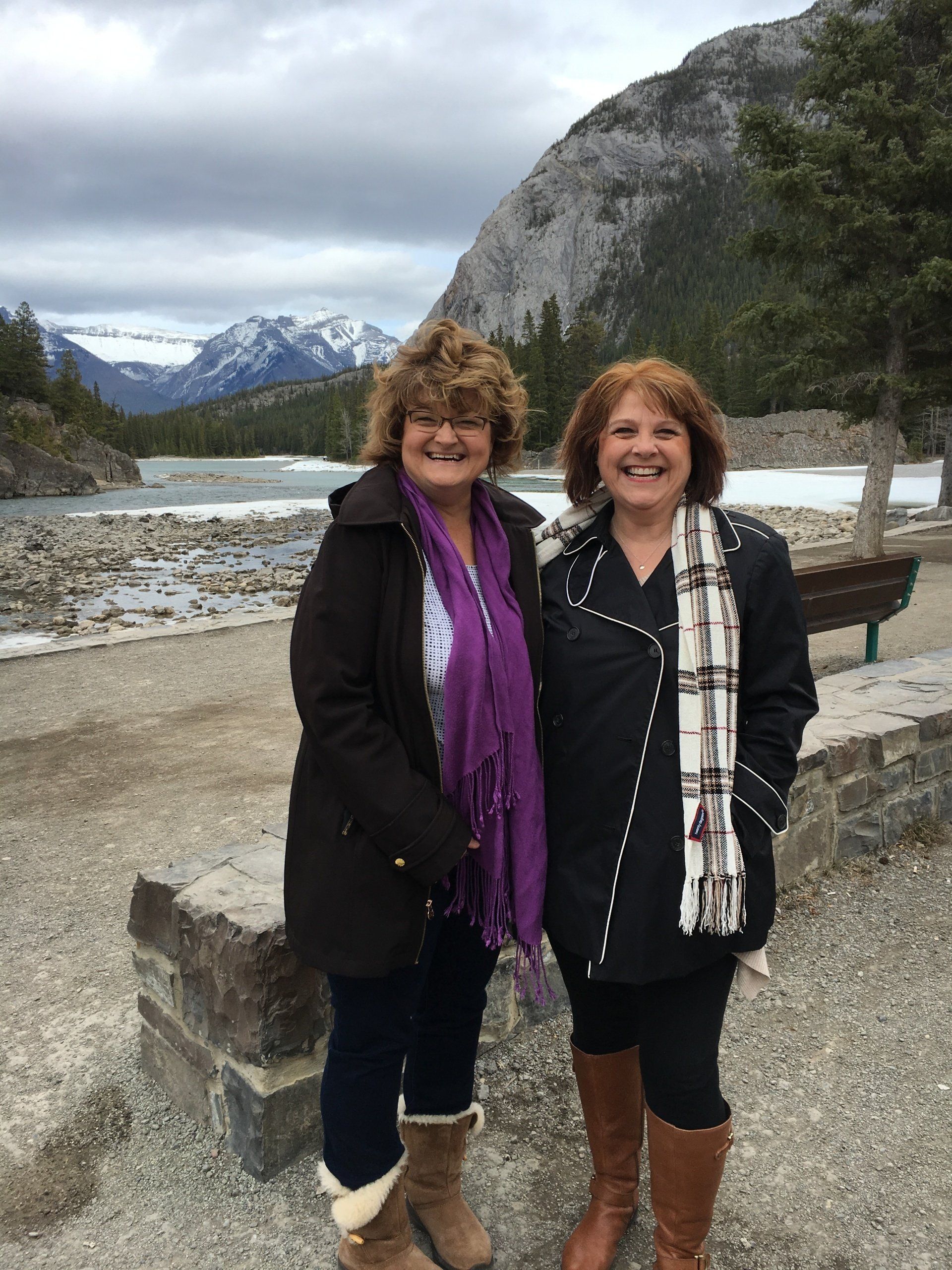 photo of Dianah Davidson and Mary Billings on a trip in the mountains wearing scarves