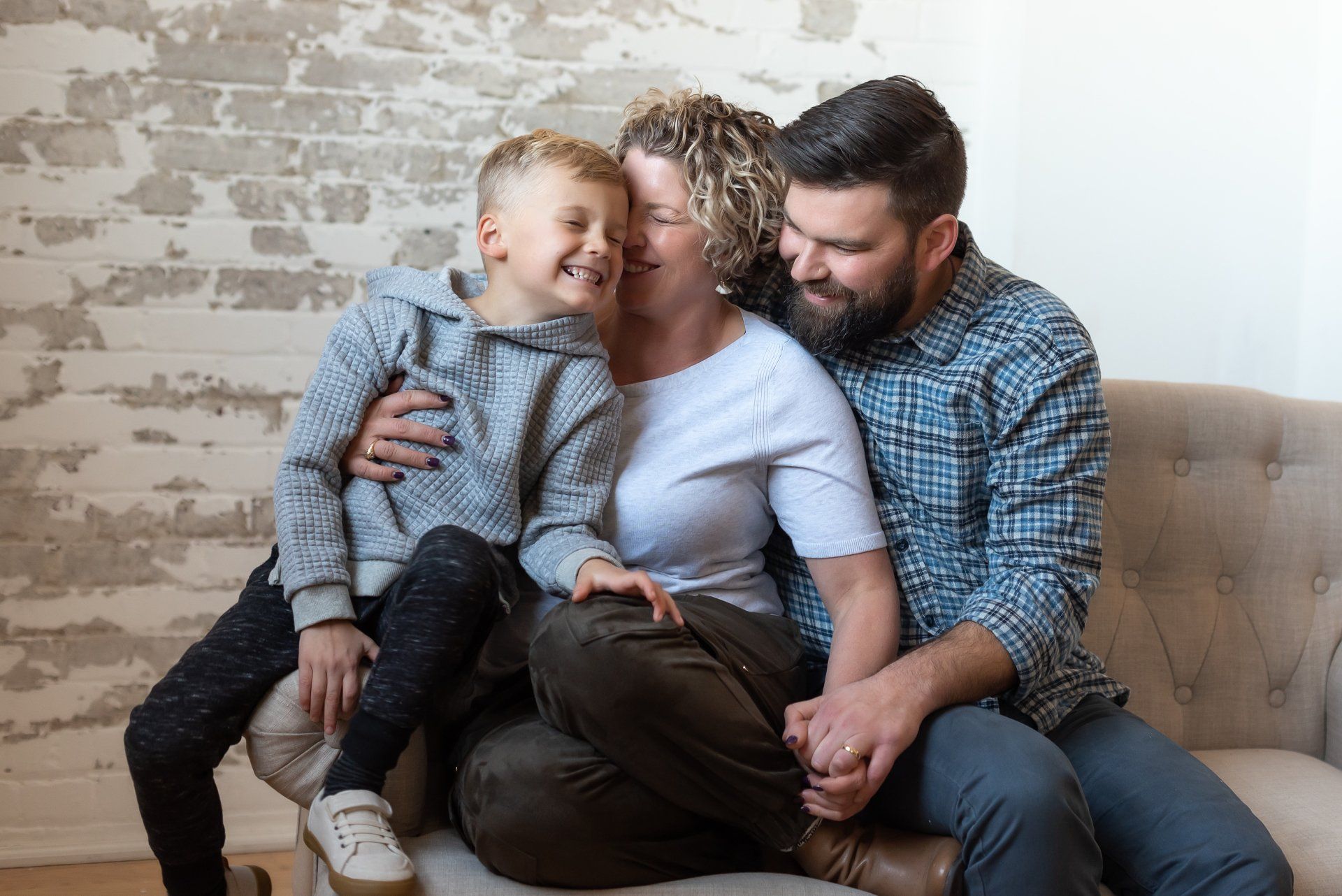 Lifestyle photography at home Toronto | Stacey Naglie |  Man and woman with small boy