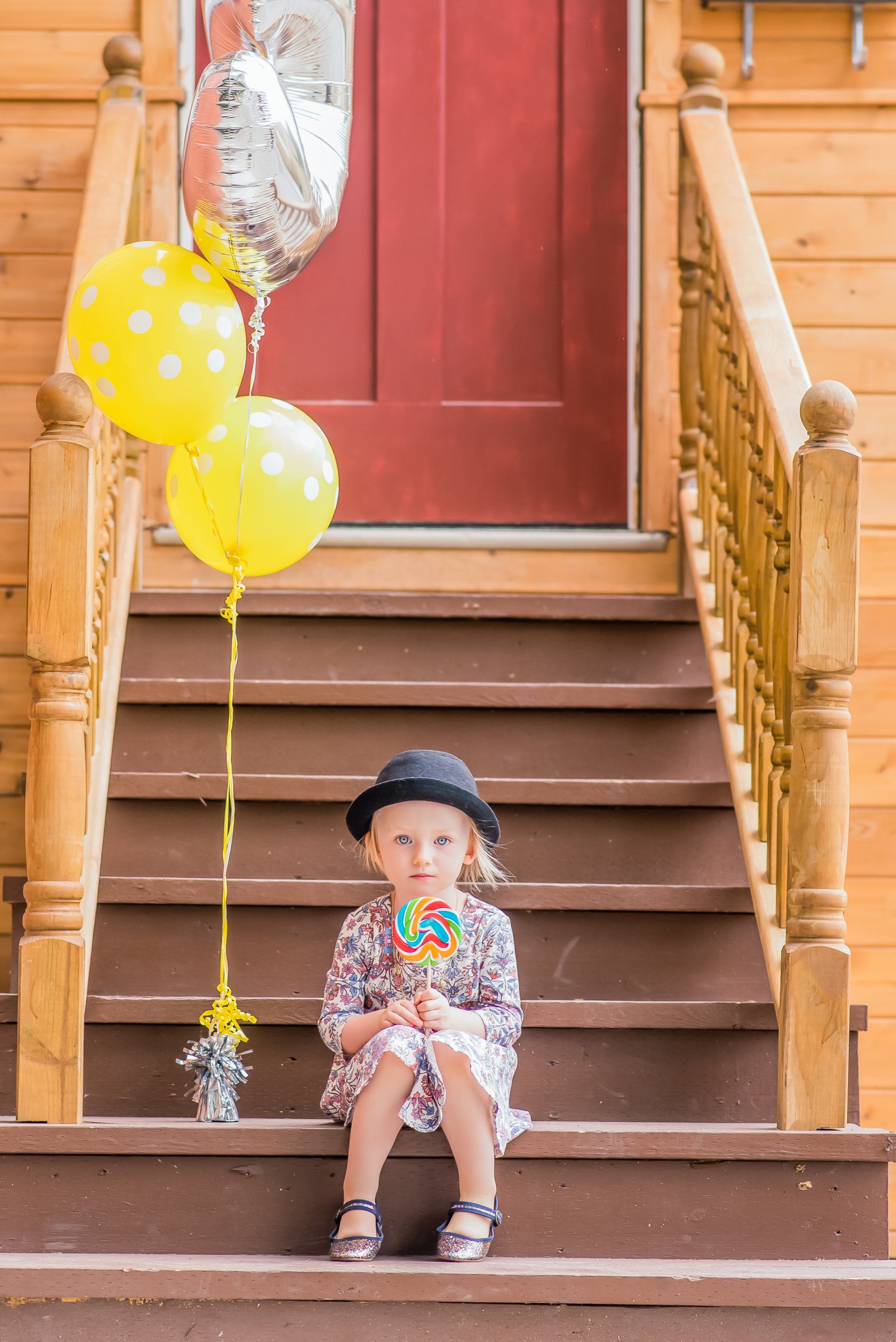 Girl with balloons on stairs | Child photography | Stacey Naglie Toronto
