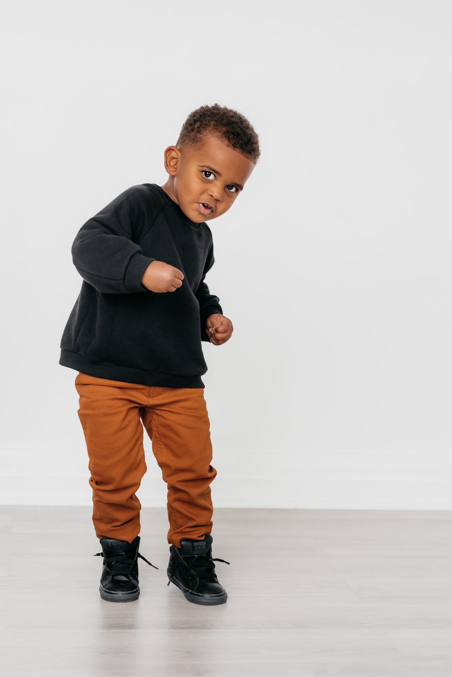 Photo of toddler dancing for family photography