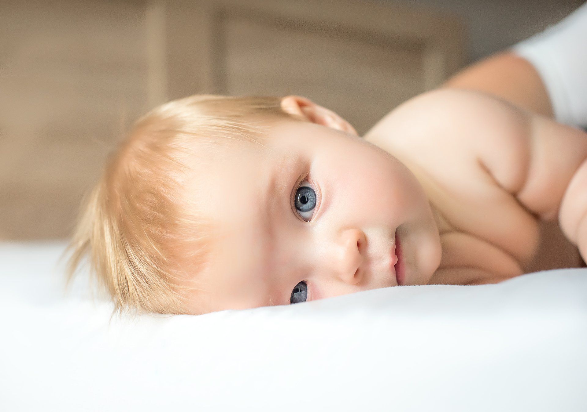 Baby lying with face to side | Child photography | Stacey Naglie Toronto