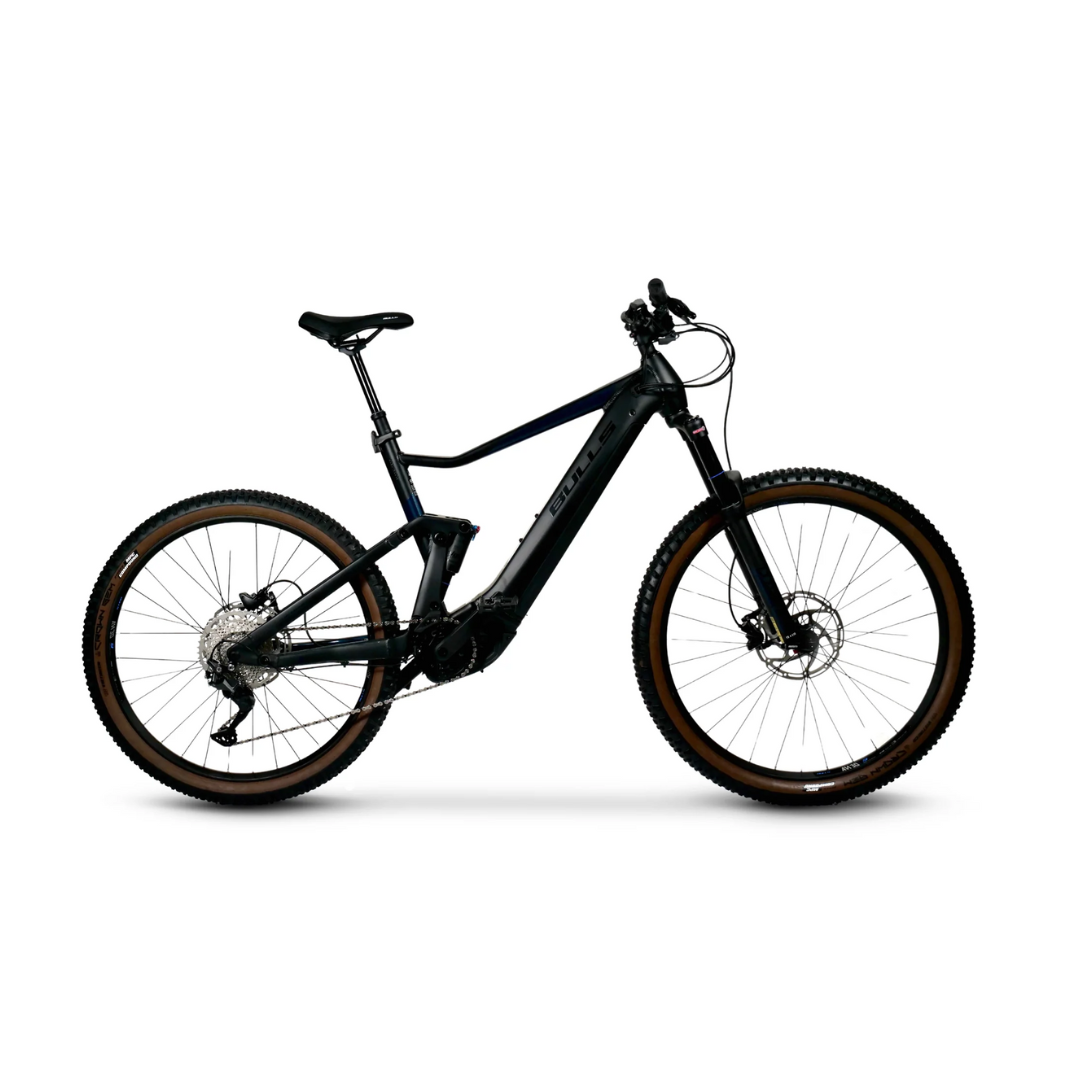 A black electric mountain bike on a white background.