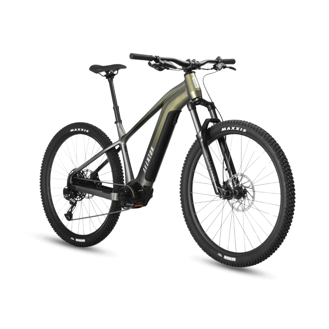 A green and black electric mountain bike on a white background.
