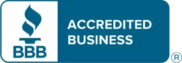 A blue sign that says accredited business on it