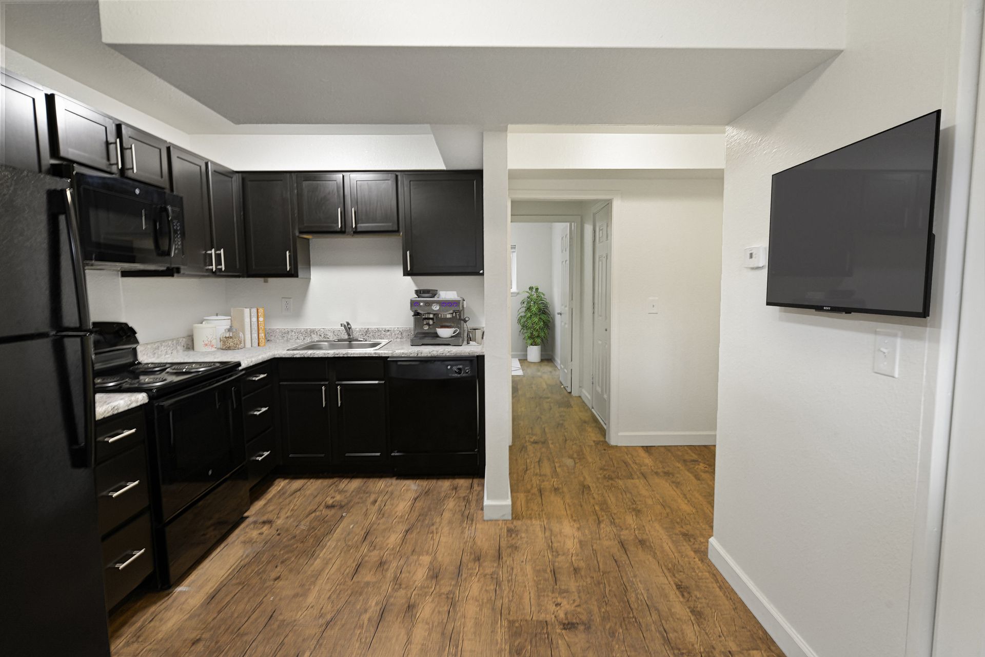 Updated kitchen with espresso cabinets