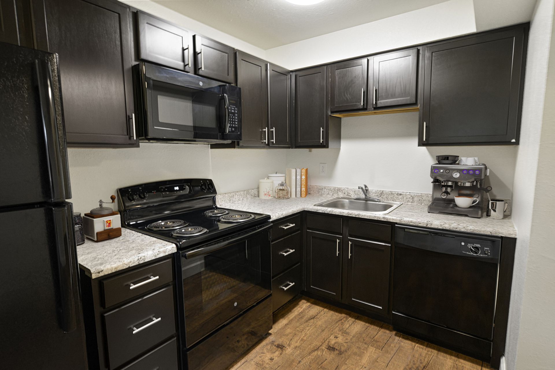 Updated kitchen with espresso cabinets