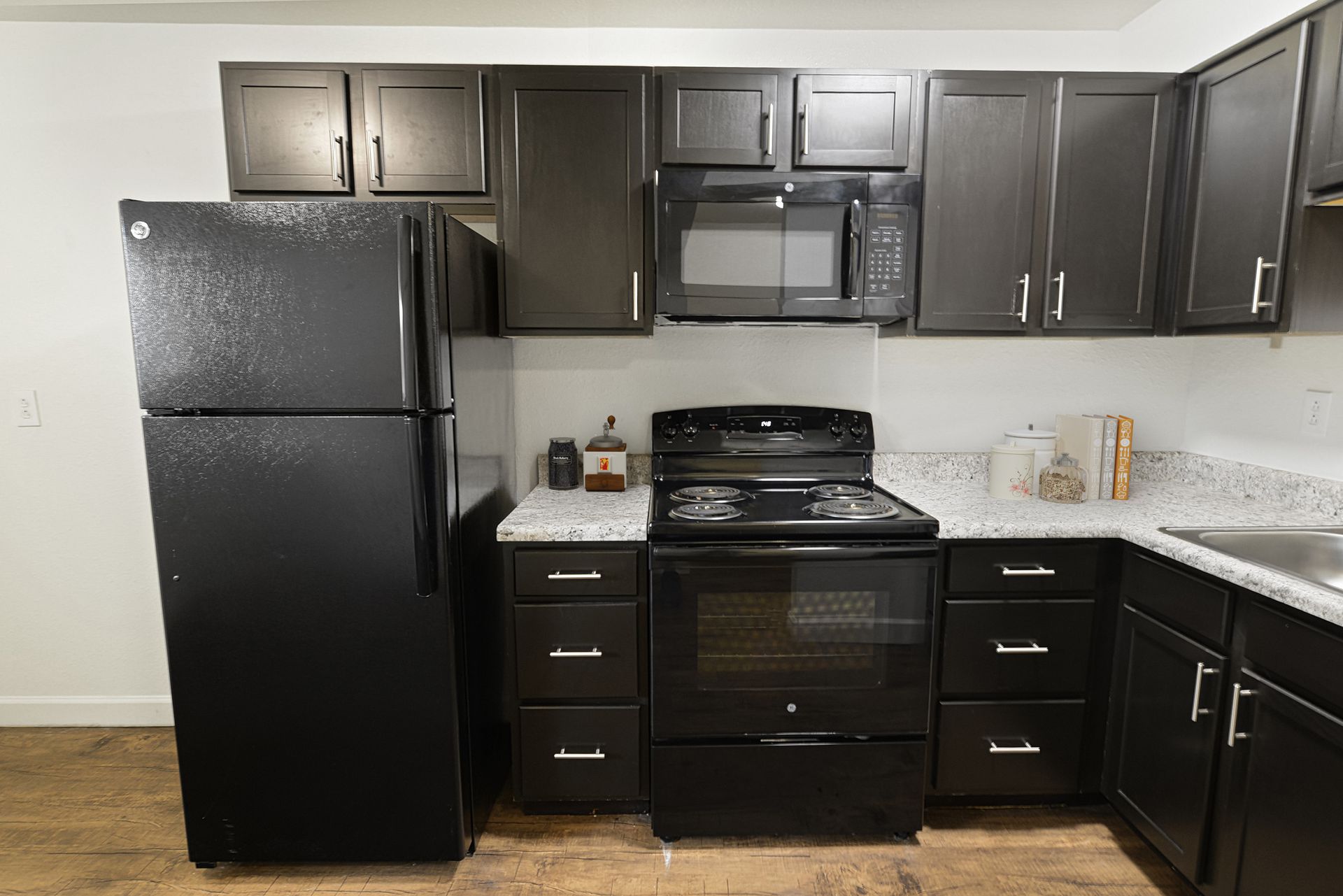 Updated kitchen with espresso cabinets