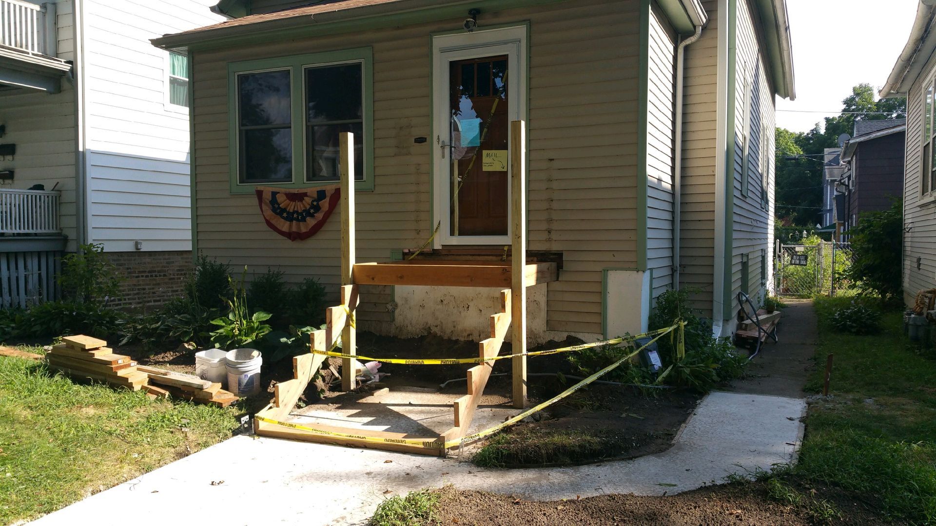 A small house with a flag on the front of it