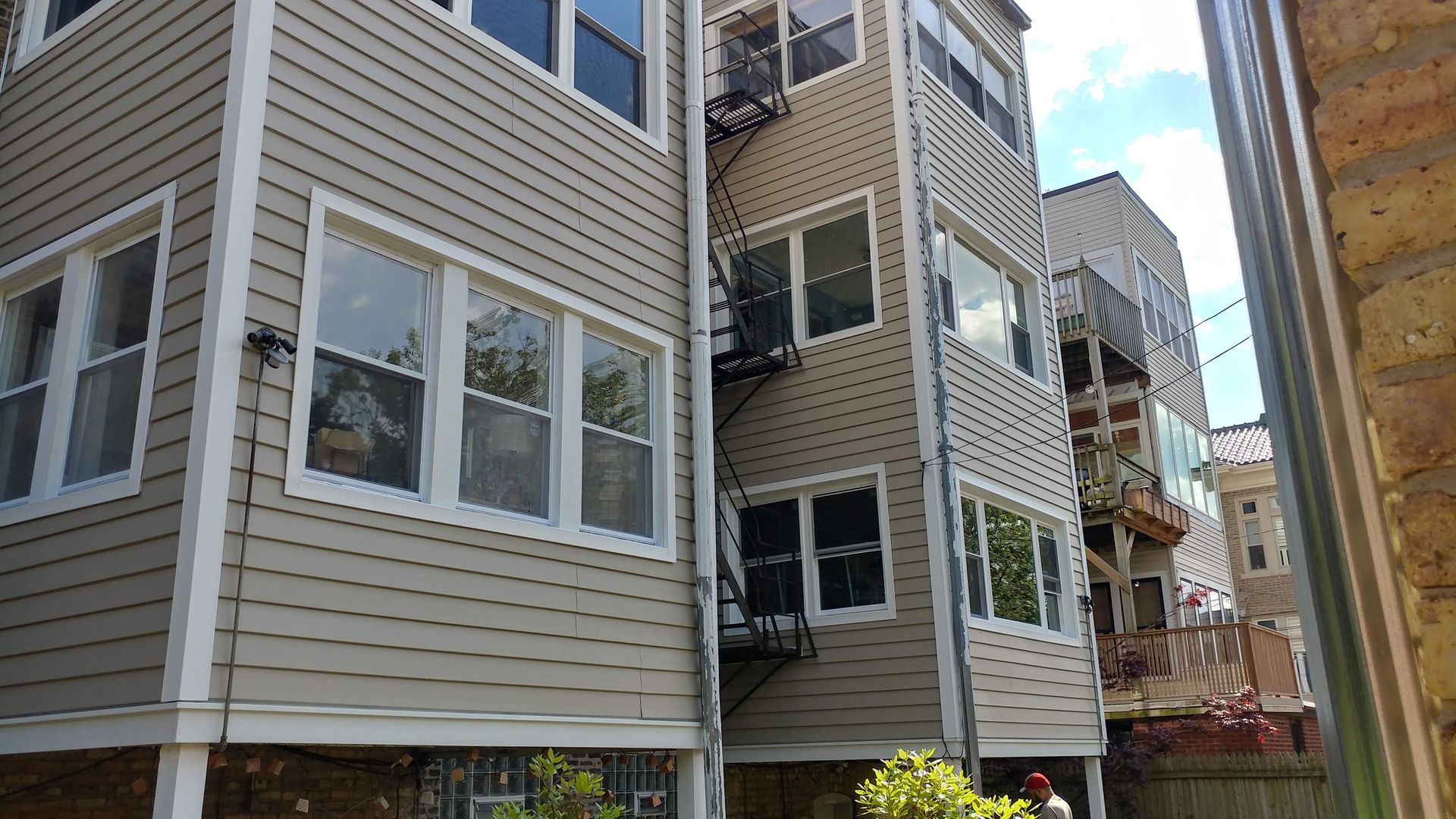 A building with a fire escape on the side of it.