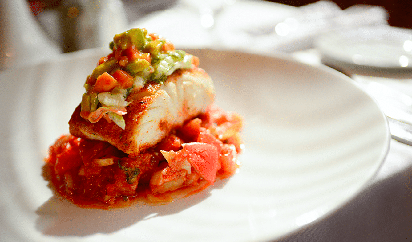 A close up of a plate of food on a table.