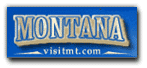 A blue sign that says montana visit tmt.com