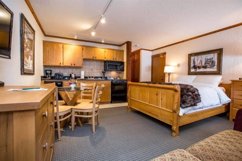 There is a large bed in the middle of the room.