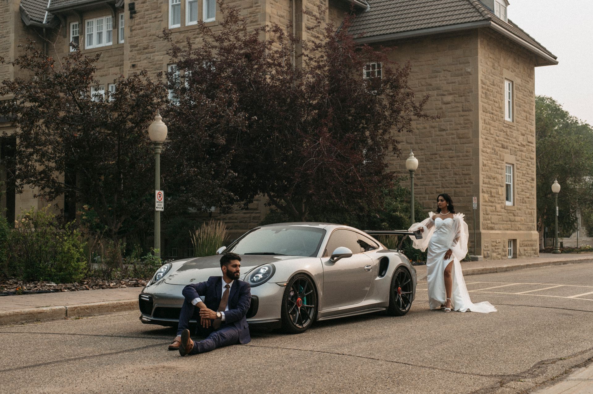 A camera is sitting on a tripod in a dark room.