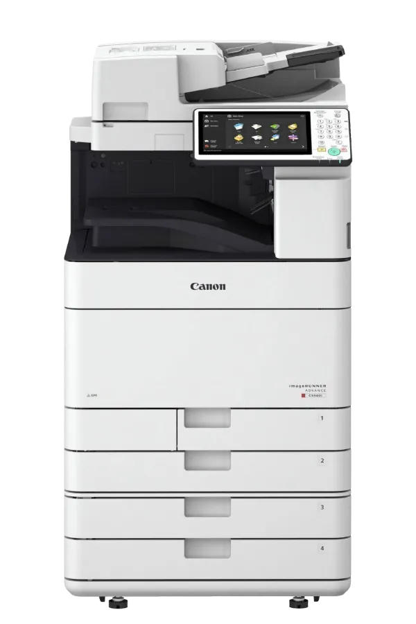 A canon printer is sitting on top of a white table.