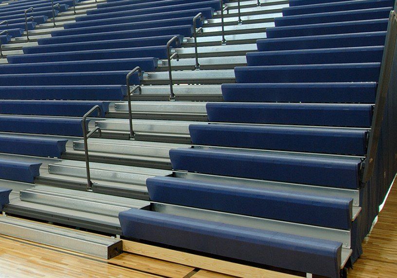 All Interkal Aisle Rail Systems for telescopic bleachers are fully in compliance with all applicable code requirements.