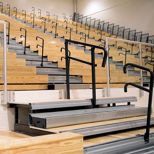 Intermediate stairs for telescopic bleacher installations