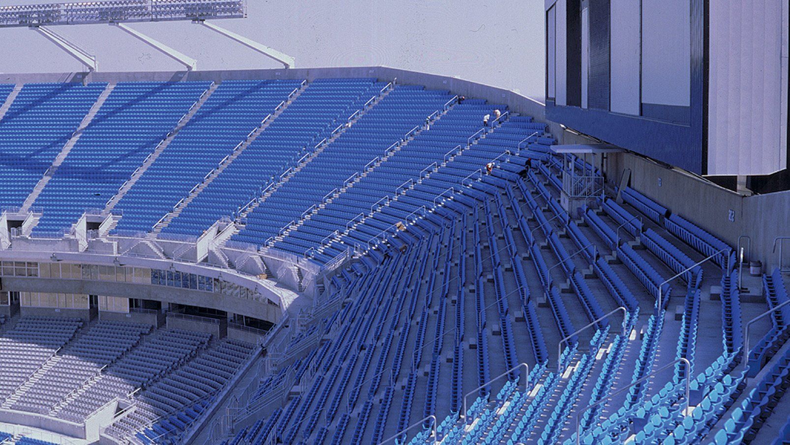 Thousands of blue Interkal AURA Solid Stadium Chairs fill out the Carolina Panthers Stadium.