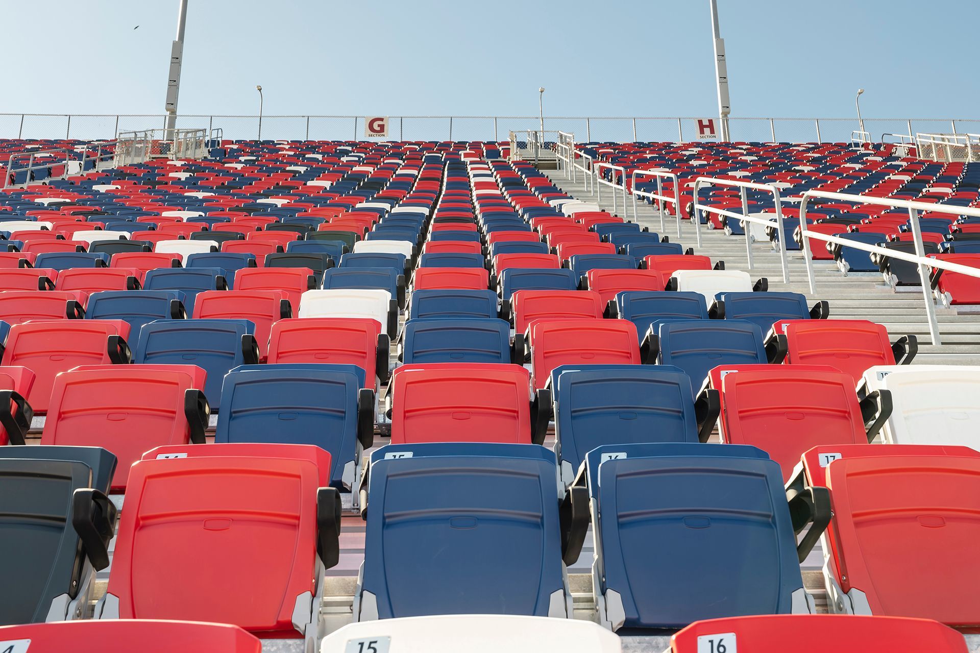 Darlington Raceway photos, featuring VISION Fixed Outdoor Chairs with armrests and cupholders.