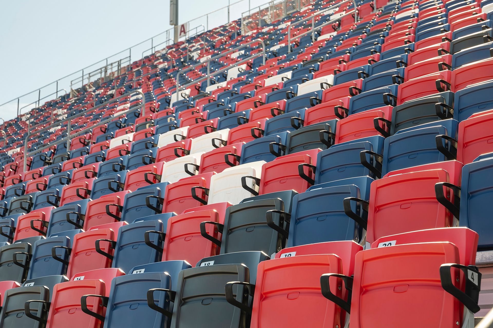 Darlington Raceway photos, featuring VISION Fixed Outdoor Chairs with armrests and cupholders.