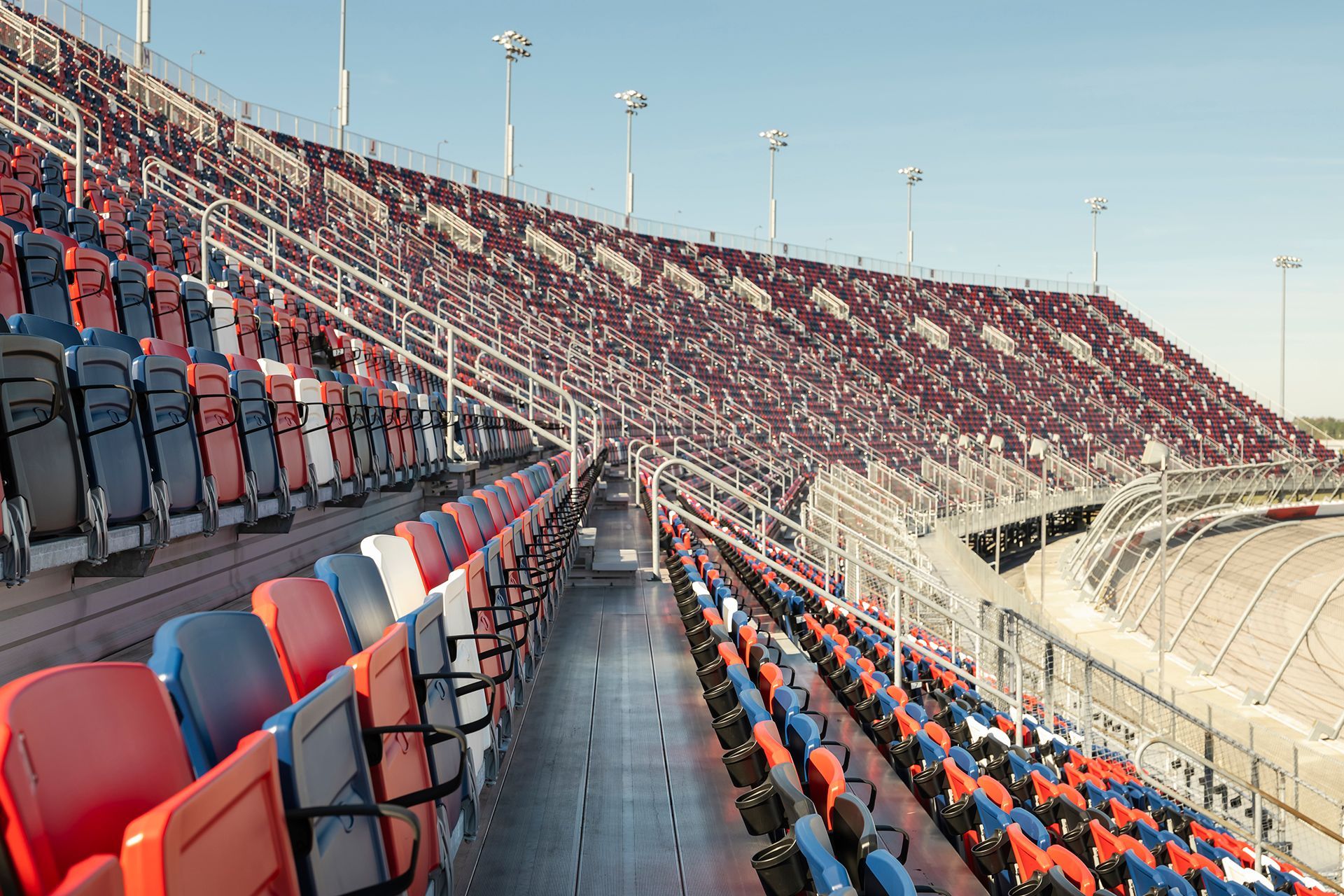 Darlington Raceway photos, featuring VISION Fixed Outdoor Chairs with armrests and cupholders.