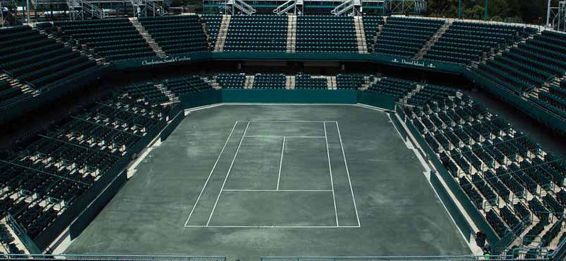 Green Interkal AURA Solid Stadium Chairs on the courts at Family Circle.