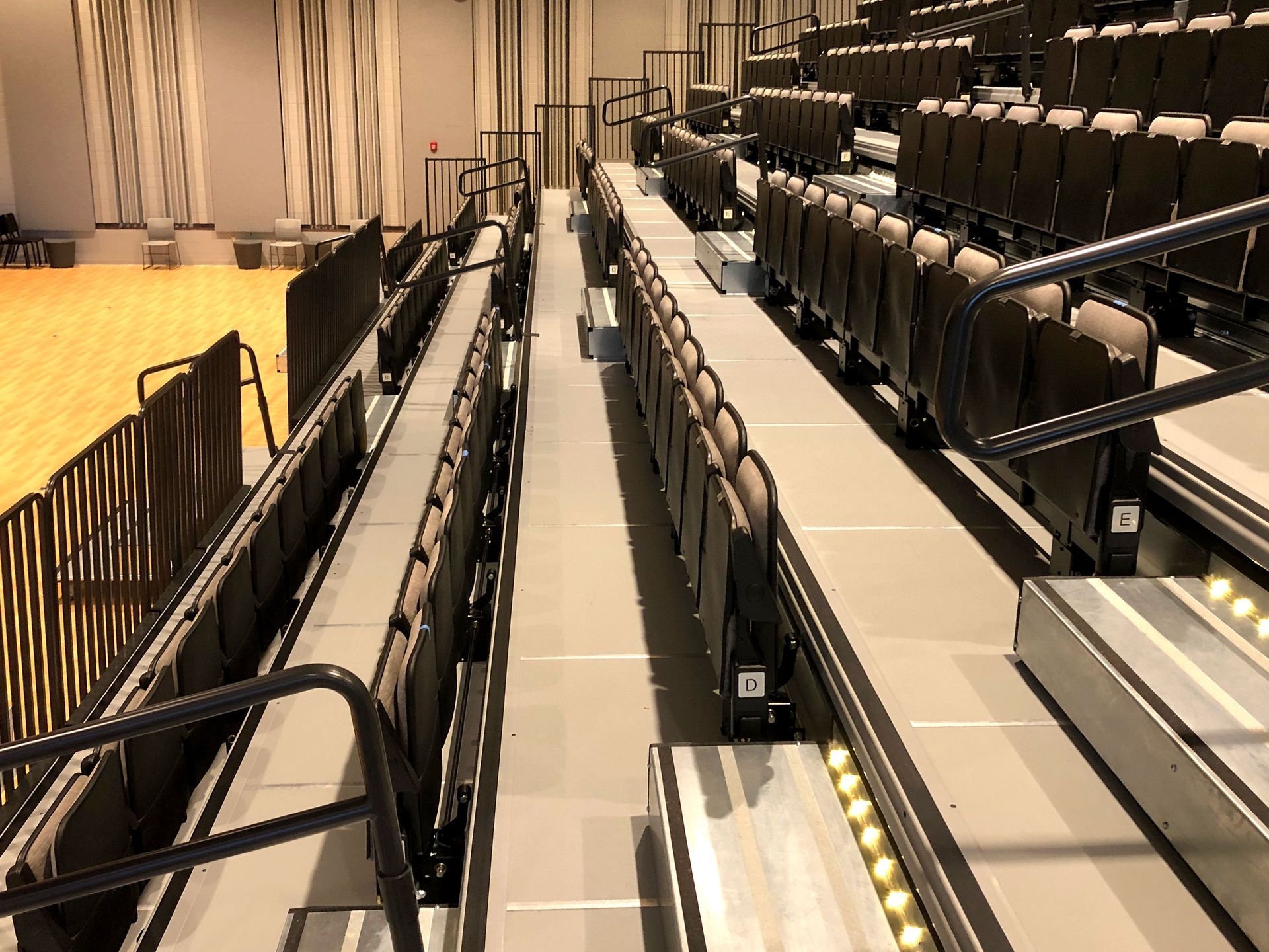 Wide-Format Premier Platforms use our UNITED Platform Chairs, complete with aisle lighting and vinyl end curtains.