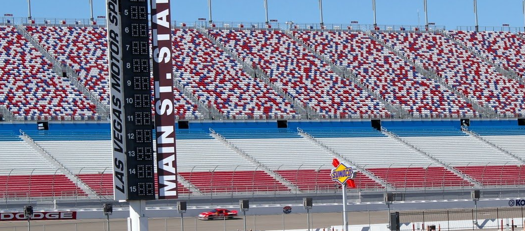 Red, white and blue Interkal AURA Solid Stadium Chairs on full display at Las Vegas Motor Speedway.
