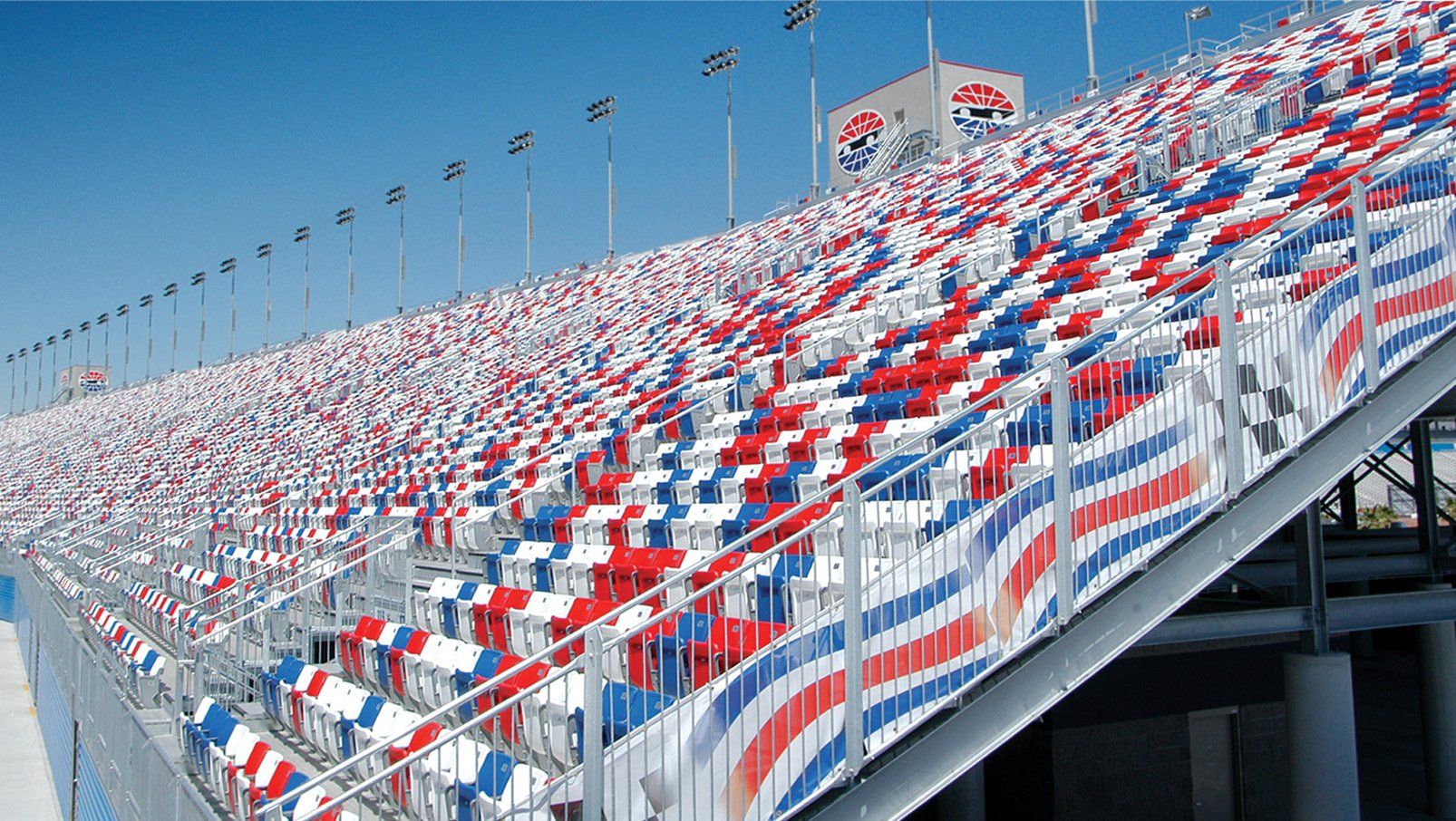 Red, white and blue Interkal AURA Solid Stadium Chairs on full display at Las Vegas Motor Speedway.