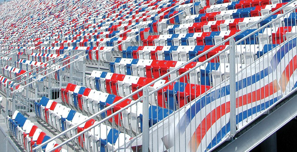 Red, white and blue Interkal AURA Solid Stadium Chairs on full display at Las Vegas Motor Speedway.