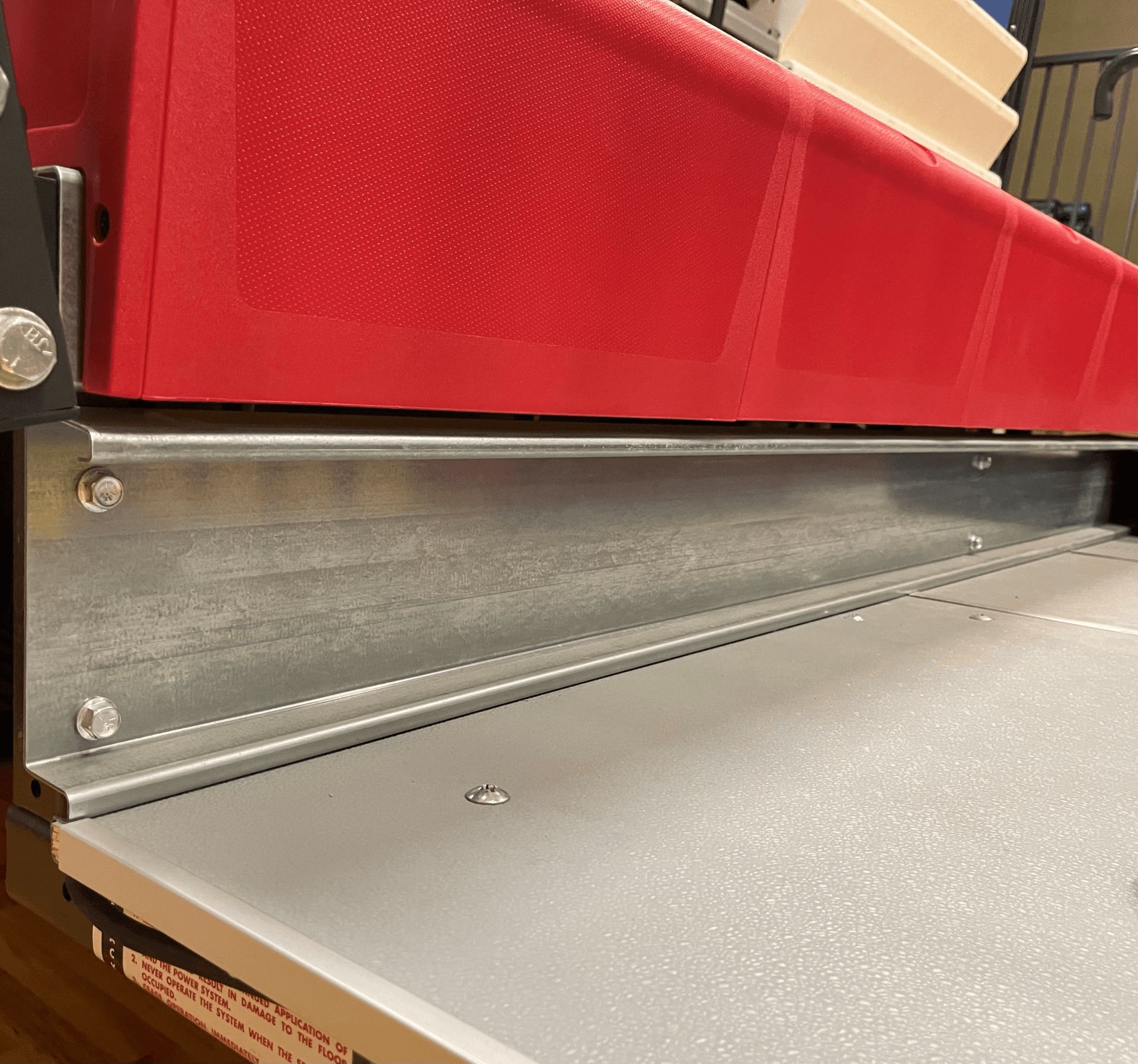 Interkal utilizes a multi-bend rear riser for durability and ensures food and trash doesn't fall behind the structure.