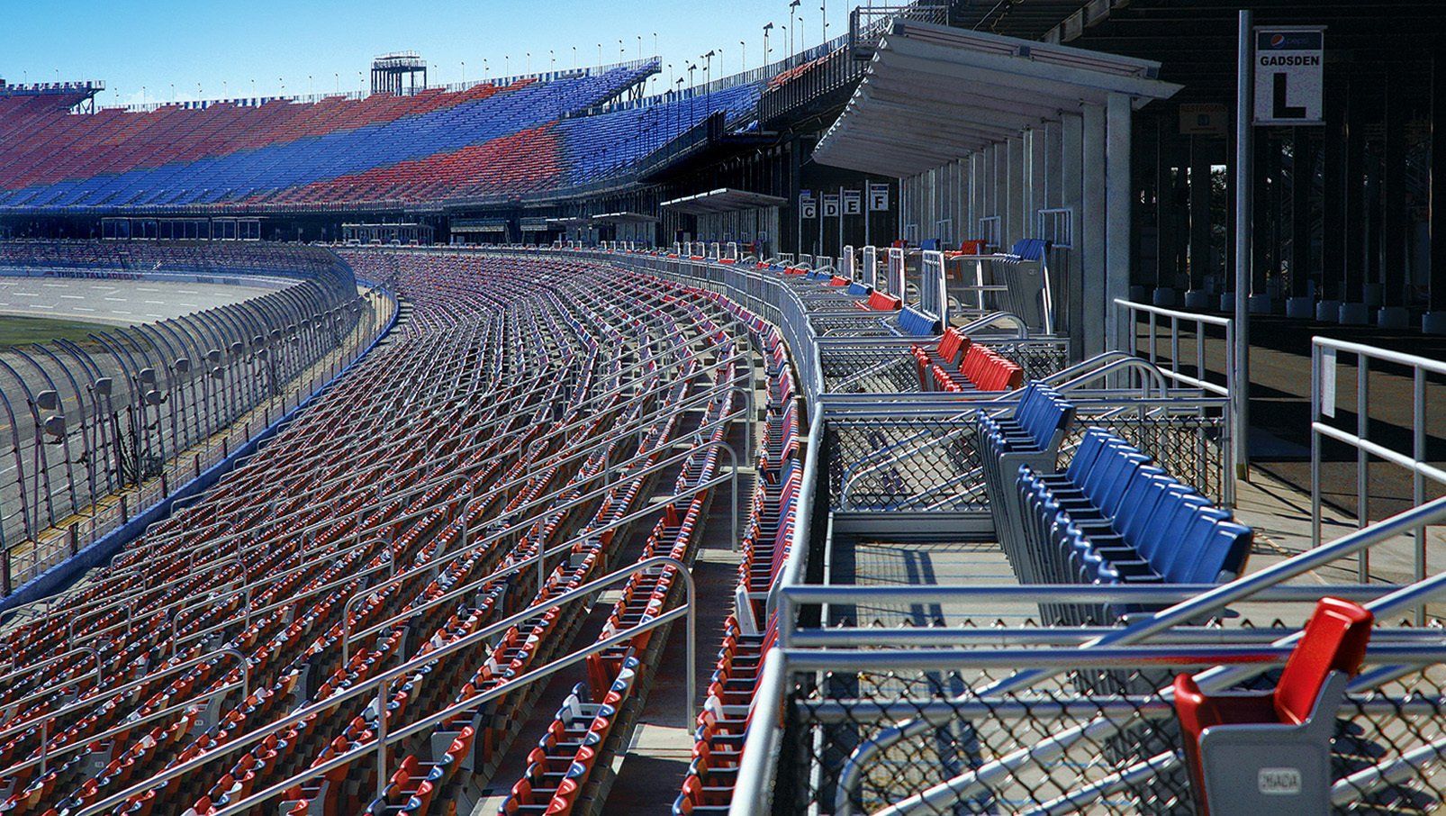 Interkal AURA Solid Stadium Chairs in red, white, blue and black at the iconic Talladega Superspeedway.