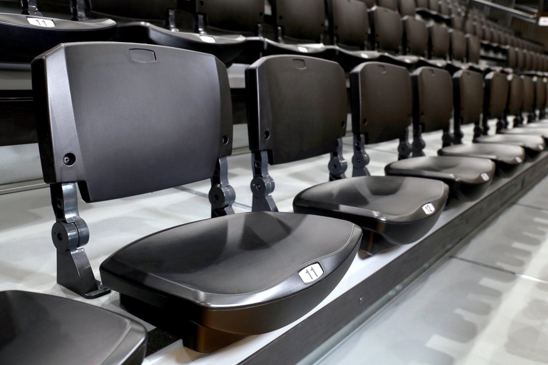 Black Interkal POLARIS multi-purpose seats with Comfoback Backrests, and EXCEL Seat Modules at the Houston High School gym.